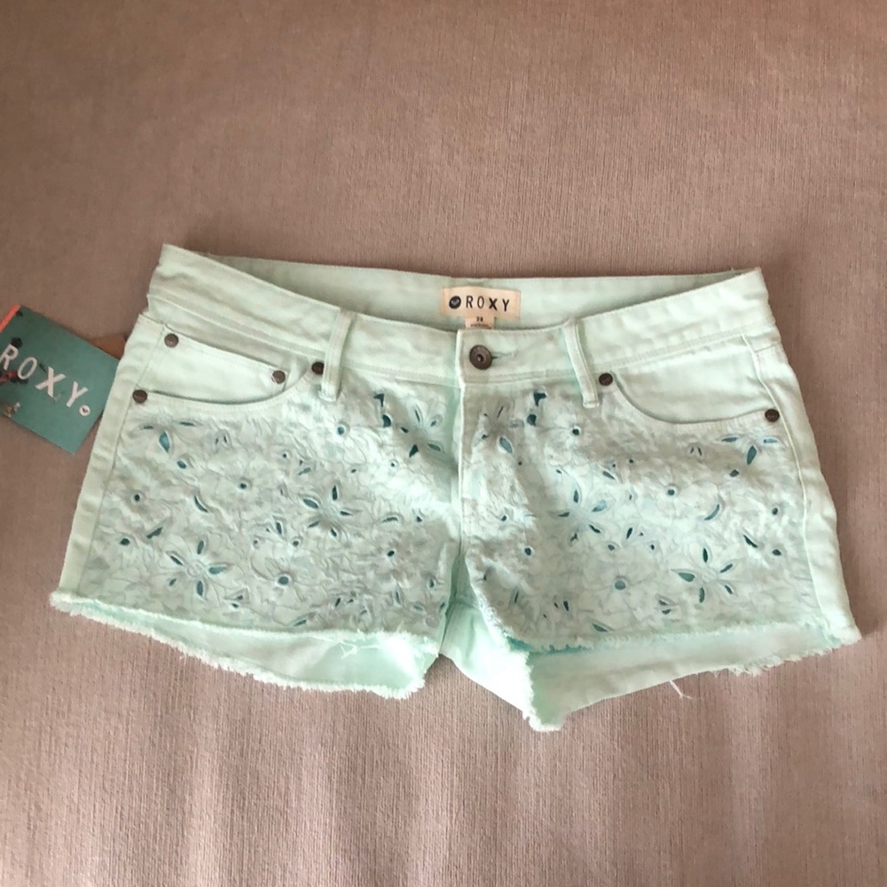 Mint green Roxy jean shorts.